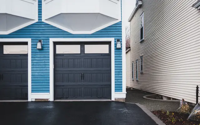 Wooden garage door on the front of a family home