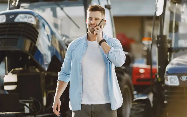 Contractor taking a call outdoors