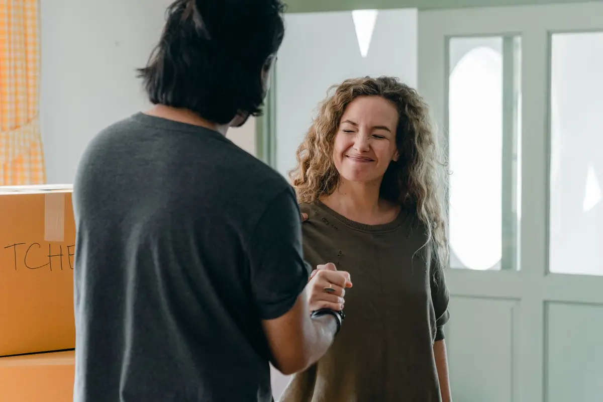 Customer shaking hands after the job is done