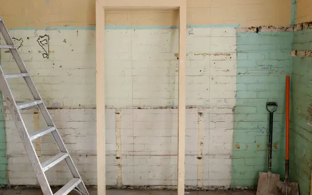 Restoration work: a room with the walls opened up for repair